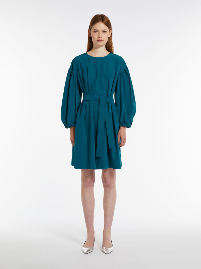 Сукні міді Relaxed Fit: вільний крій для максимального комфорту.