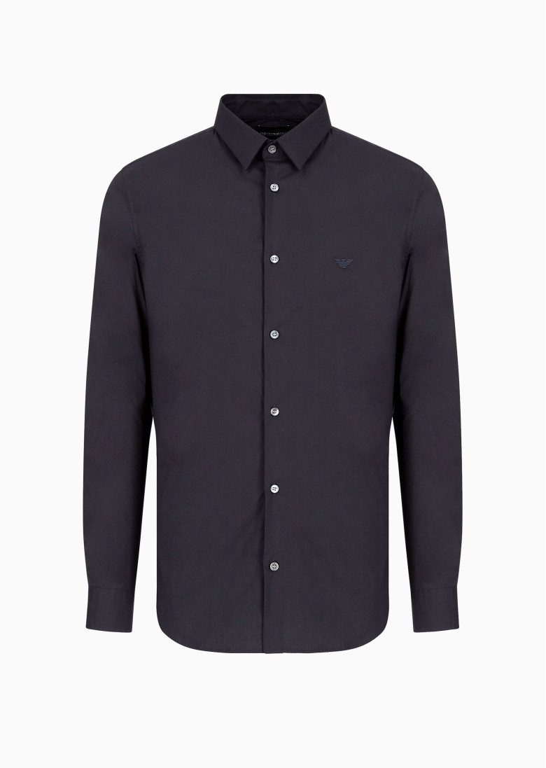 сорочка ділова Slim Fit: приталений силует, але не надто вузький.
