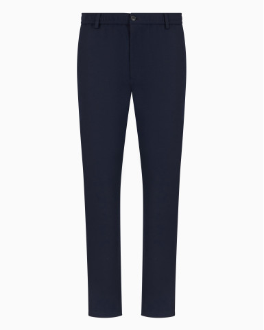Брюки chinos Slim Fit: приталений силует, але не надто вузький. Висока