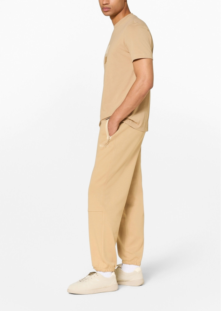 Брюки джерсі Relaxed Fit Висока — фото 4